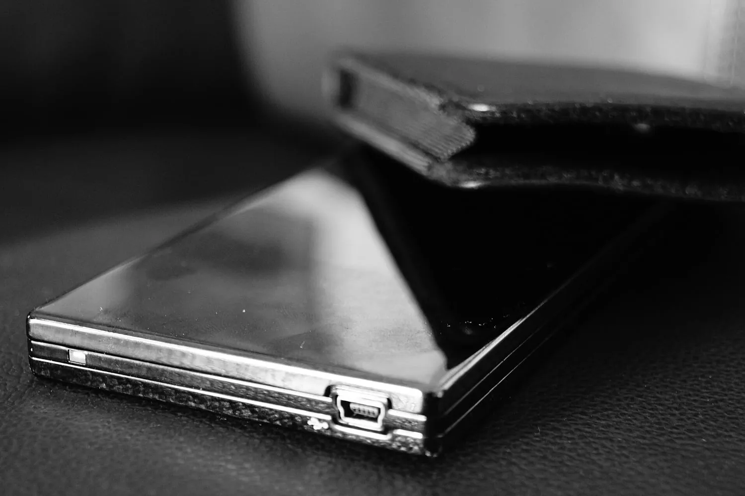 A solid state drive and memory modules laid on a bench